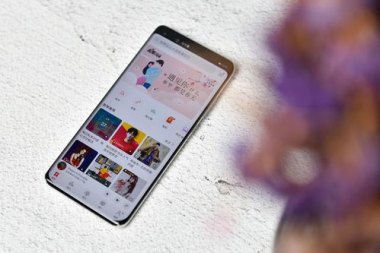 华为手机怎么拉伸图像